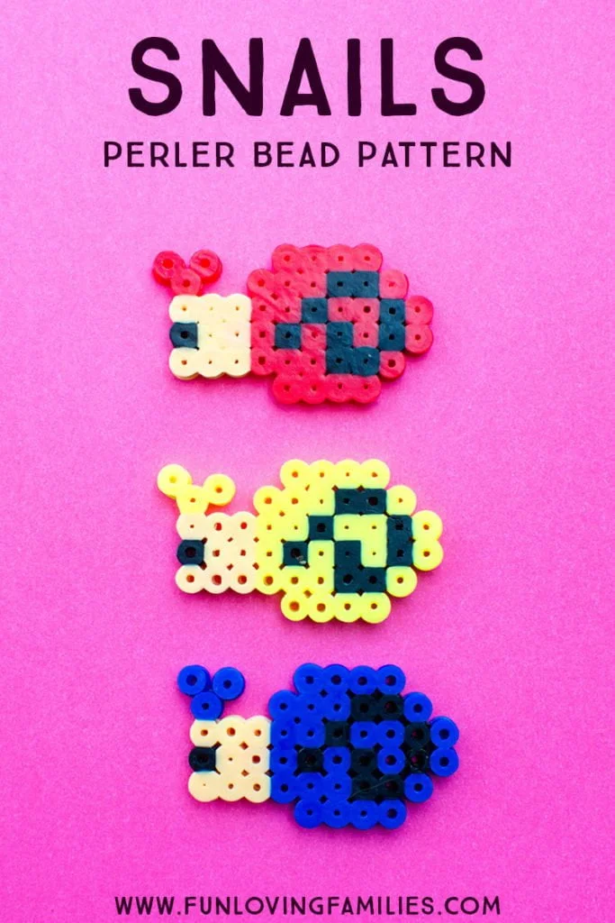 Perler bead snails in red, yellow, and blue